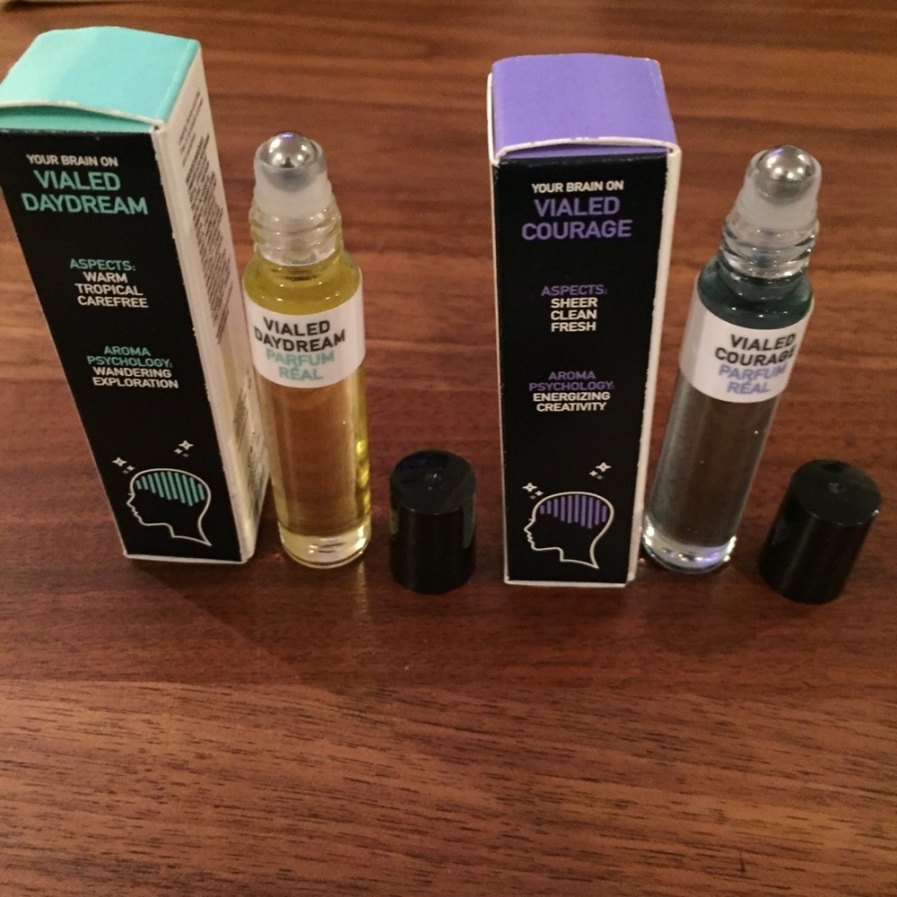 2 perfume roll on aroma therapy.